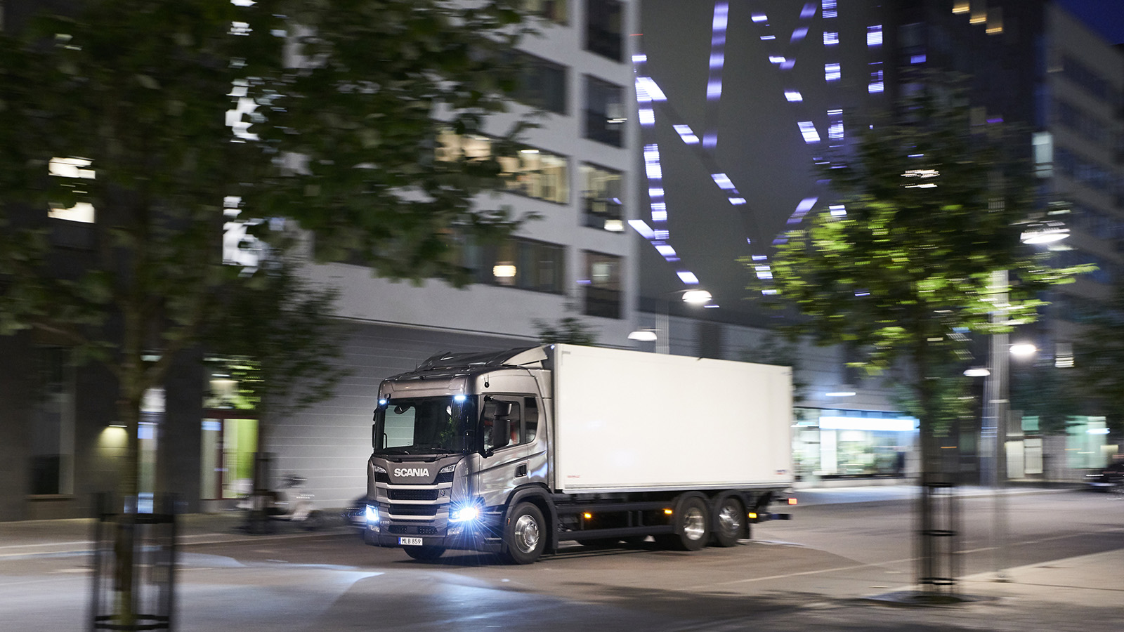 Scania truck on city street 